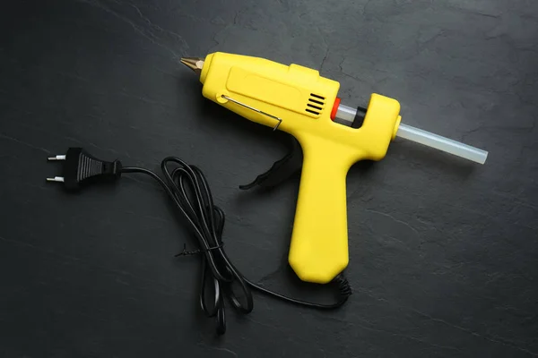 Yellow Glue Gun Stick Black Table Top View — Photo