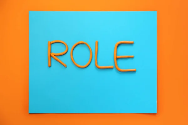 Word Role Made Plasticine Orange Background Flat Lay — Stockfoto