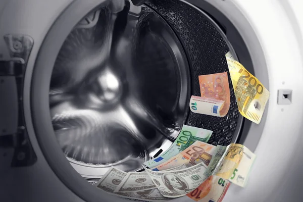 Money laundering. Many euro banknotes in washing machine