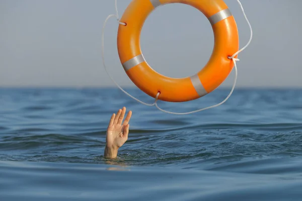 Drowning Woman Raised Hand Getting Lifebelt Sea — Stockfoto