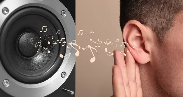 Modern Audio Speaker Man Listening Music Beige Background Closeup View — Stock Fotó