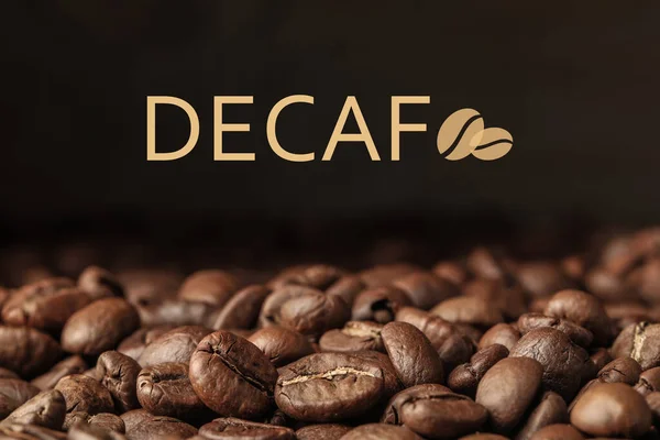 Many Decaf Coffee Beans Dark Background Closeup — Stockfoto