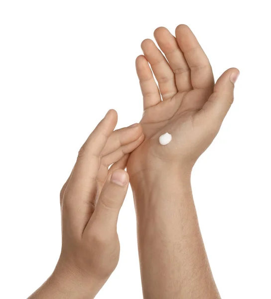 Man Applying Cream Hands White Background Closeup — Stockfoto