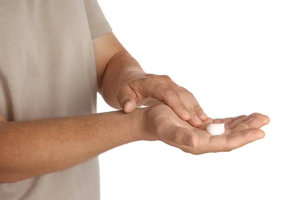 Man Applying Cream Hands White Background Closeup — Stock fotografie