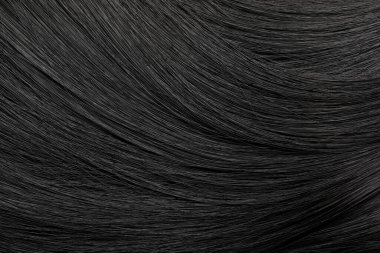 Beautiful black hair as background, closeup view