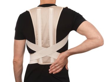 Closeup of man with orthopedic corset on white background, back view