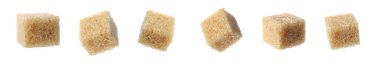 Set with cubes of brown sugar on white background. Banner design