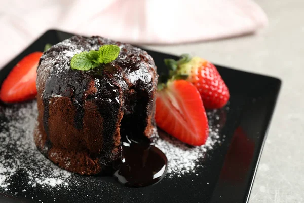 Delicious Warm Chocolate Lava Cake Mint Strawberries Plate Closeup — 스톡 사진