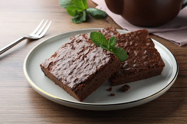 Delicious Chocolate Brownies Fresh Mint Served Wooden Table Closeup — Stockfoto