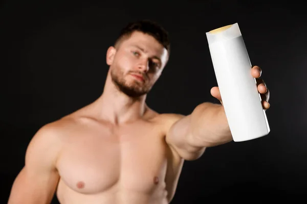 Shirtless Young Man Holding Bottle Shampoo Black Background Focus Hand — Stock Photo, Image