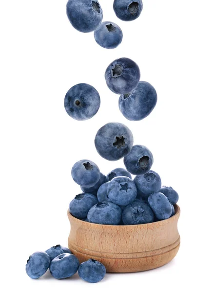 Tasty Fresh Ripe Blueberries Falling Bowl White Background —  Fotos de Stock