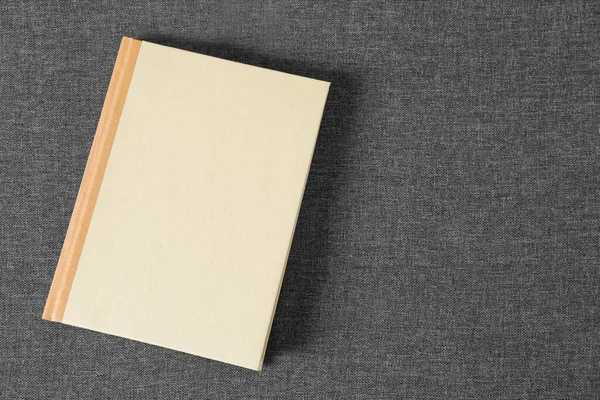 Hardcover Book Grey Fabric Top View Space Text — Stockfoto