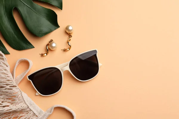 New Stylish Elegant Sunglasses Beautiful Earrings Bag Beige Background Flat — Stockfoto