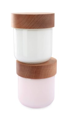 Jars of face cream isolated on white