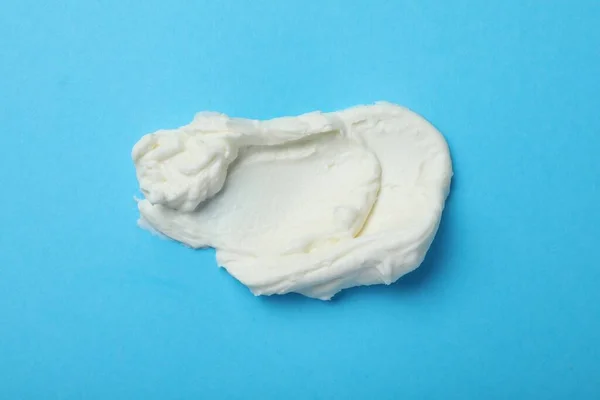 Smear Delicious Cream Cheese Light Blue Background Top View — Stock Photo, Image