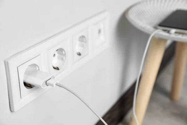 Modern Smartphone Charging Electric Socket Indoors Closeup Space Text — 스톡 사진