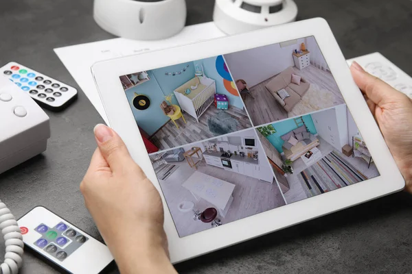 Woman Monitoring Cctv Cameras Tablet Grey Table Closeup Home Security — 스톡 사진