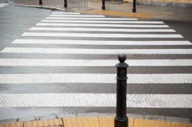 View on pedestrian crossing in city. Road regulations