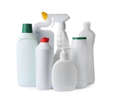 Bottles with different detergents on white background. Cleaning supplies