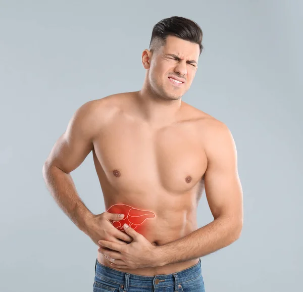 Man suffering from flank pain on white background Stock Photo - Alamy