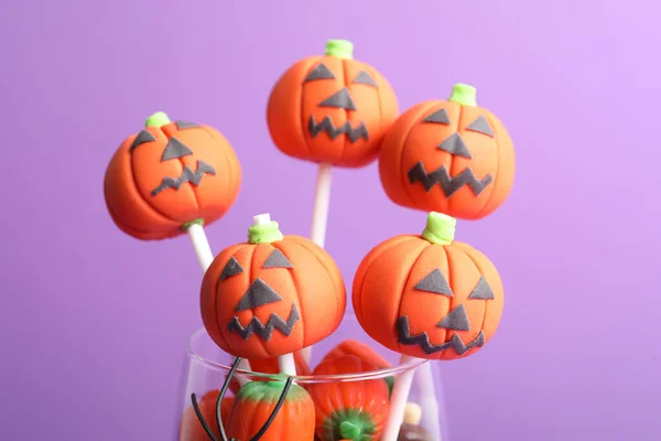 Delicious Pumpkin Shaped Cake Pops Violet Background Closeup Halloween Treat — Foto Stock