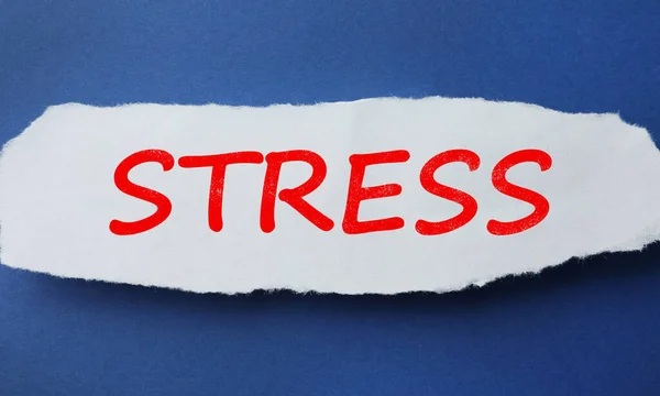 Piece Paper Word Stress Blue Background Top View — Stockfoto