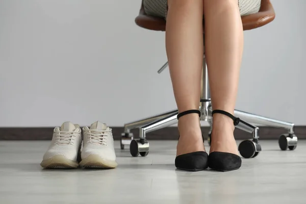 Comfortable Sneakers Businesswoman Wearing Elegant Shoes Indoors Closeup — Foto de Stock