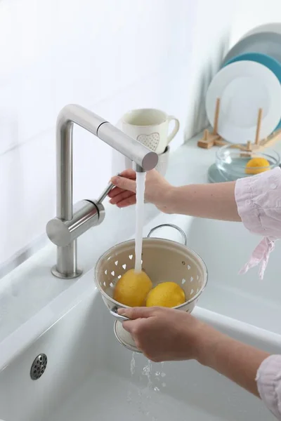 Woman Washing Fresh Ripe Lemons Tap Water Kitchen Closeup — Stok Foto