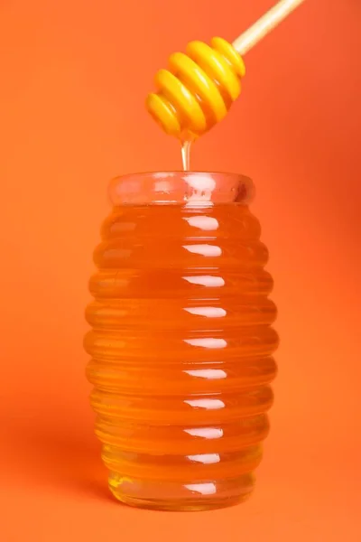 Jar Organic Honey Dipper Orange Background — ストック写真