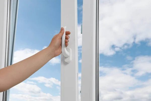 Woman Opening White Plastic Window Home Closeup — стоковое фото
