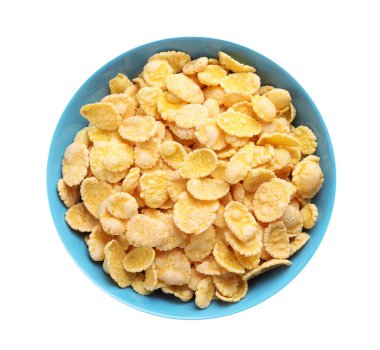Bowl of tasty crispy corn flakes isolated on white, top view