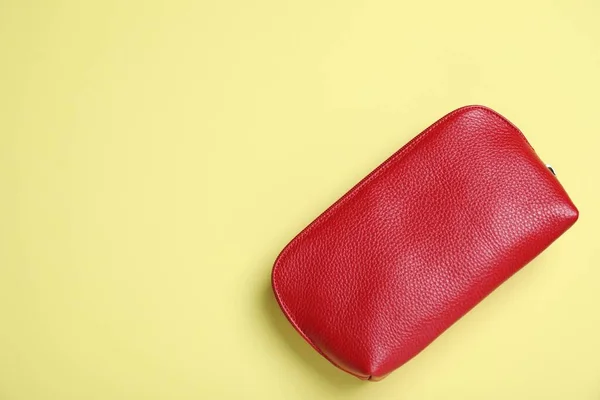 Red Leather Cosmetic Bag Yellow Background Top View Space Text — 스톡 사진