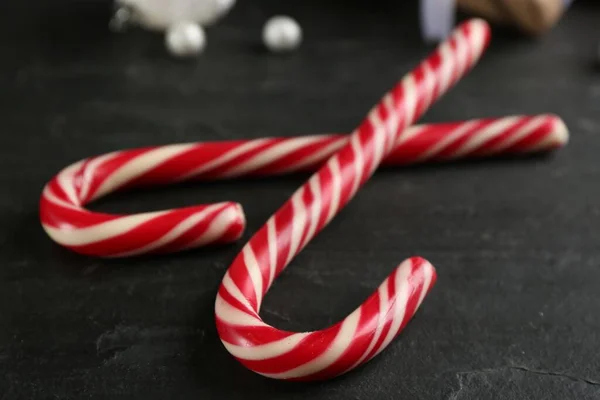 Sweet Christmas Candy Canes Black Table Closeup — Foto de Stock