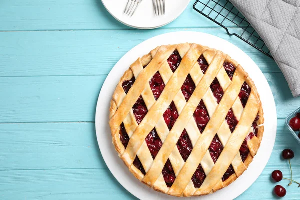 Flat Lay Composition Tasty Cherry Pie Light Blue Wooden Table — Stockfoto