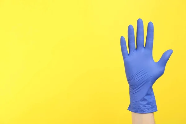Person Medical Gloves Yellow Background Closeup Hand Space Text — 스톡 사진