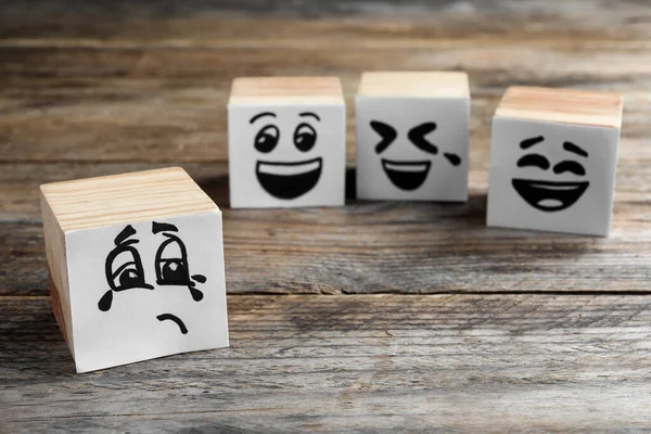 Cubes Sad Funny Faces Wooden Table Bullying Concept — ストック写真