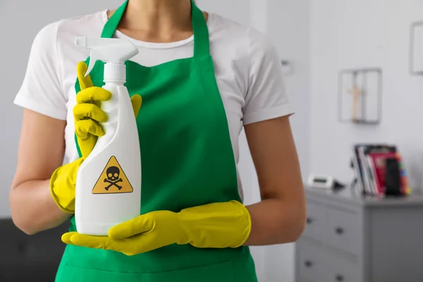 Woman Showing Toxic Household Chemical Spray Warning Sign Closeup — Zdjęcie stockowe