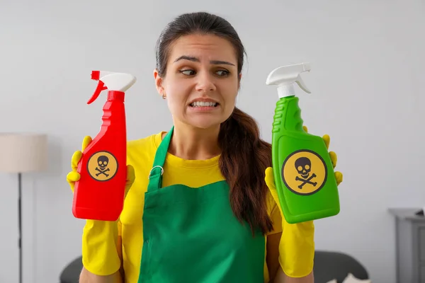 Woman Showing Bottles Toxic Household Chemical Warning Signs Closeup — 图库照片