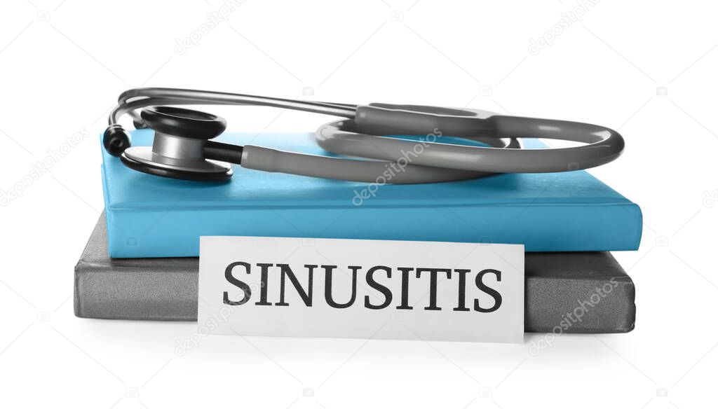 Card with word SINUSITIS, stethoscope and books on white background