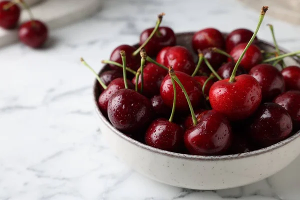 Fresh Ripe Cherries Water Drops Bowl White Marble Table Closeup — Stockfoto