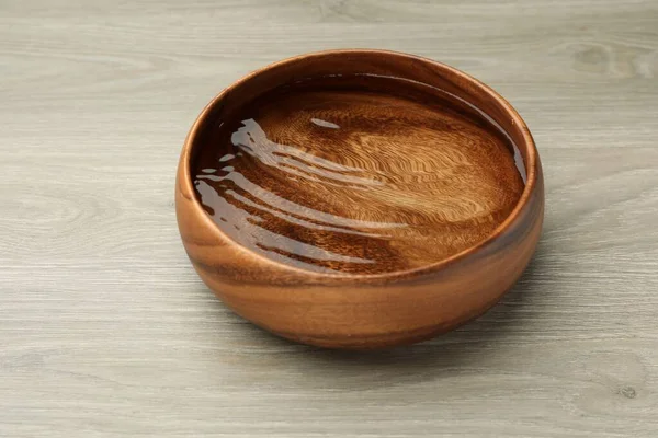 Bowl Water Wooden Table Closeup — ストック写真
