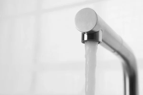 Stream Water Flowing Tap White Background Closeup Space Text — Stockfoto