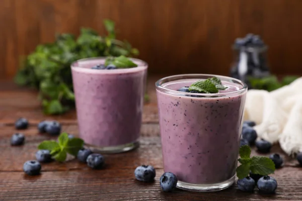 Glasses Blueberry Smoothie Fresh Berries Mint Wooden Table Space Text —  Fotos de Stock