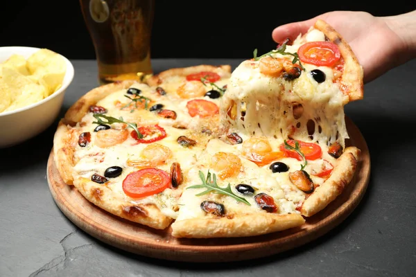 Woman Taking Slice Cheese Pizza Seafood Black Table Closeup — Stockfoto