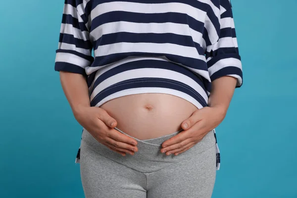 Pregnant Woman Light Blue Background Closeup — Foto Stock