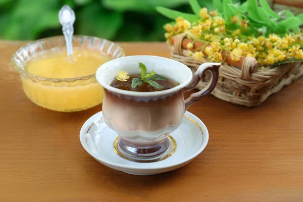 Cup Hot Aromatic Herbal Tea Honey Linden Blossoms Wooden Table — Fotografia de Stock