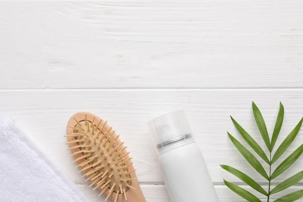 Dry Shampoo Spray Hairbrush Towel Green Twig White Wooden Table — Stockfoto