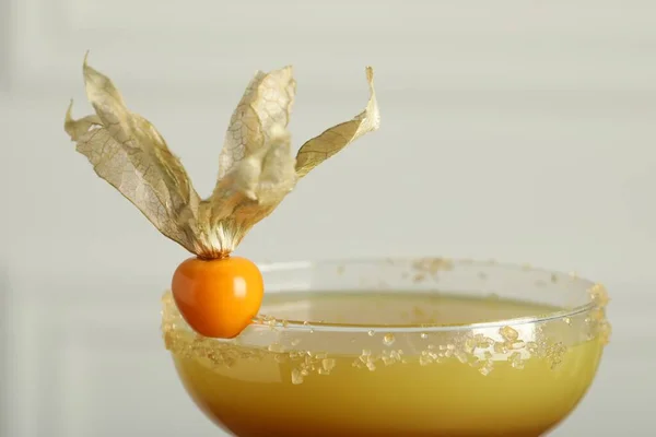 Refreshing Cocktail Decorated Physalis Fruit Light Background Closeup — 스톡 사진