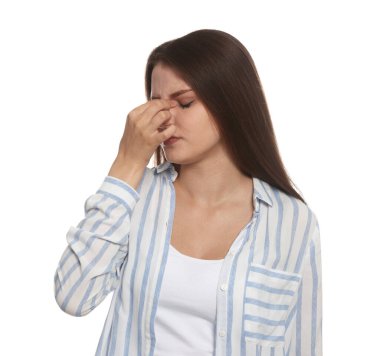 Young woman suffering from eyestrain on white background