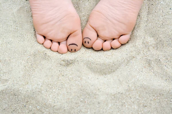Woman Smiling Faces Drawn Toes Closeup Foot Space Text — Zdjęcie stockowe